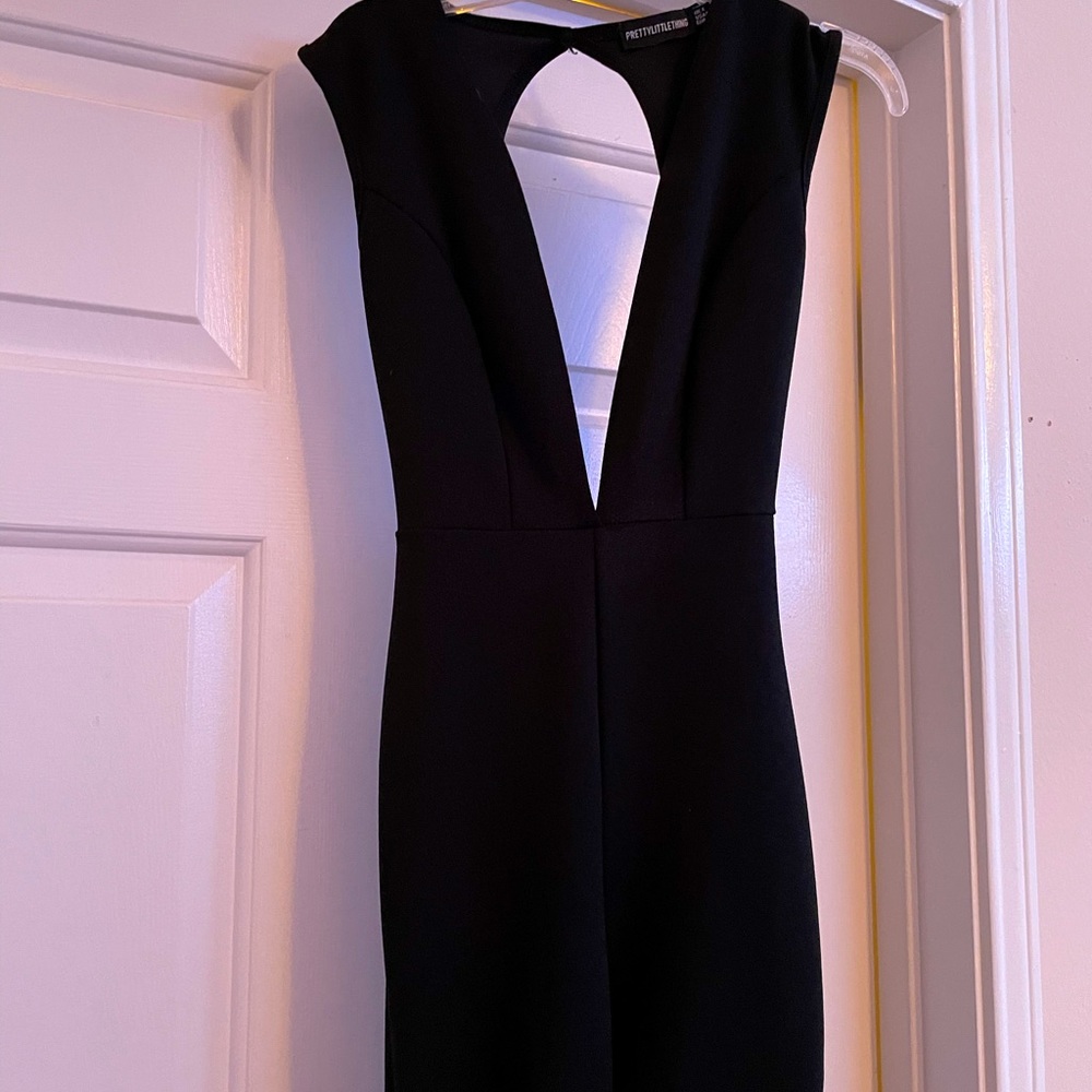 Long short sleeve cut out jumpsuit.